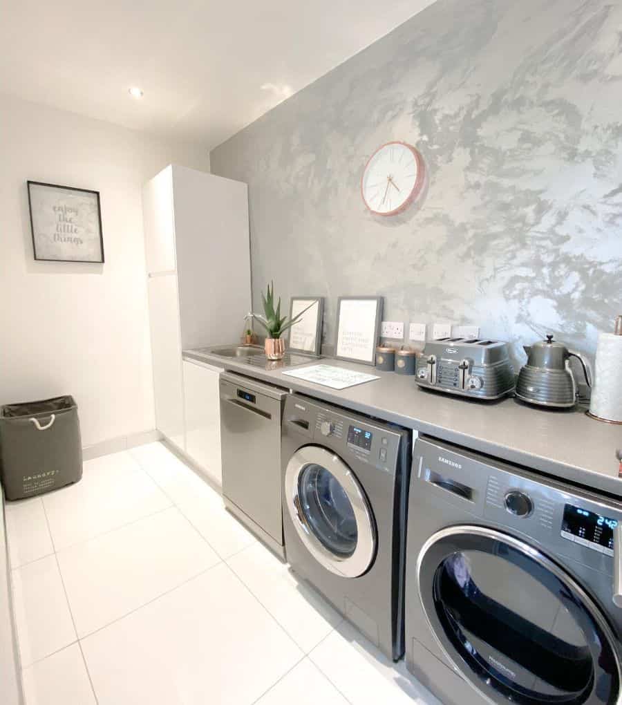 modern laundry kitchen gray wallpaper feature wall washer and dryer 