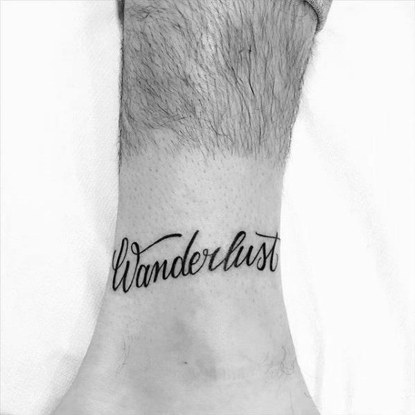 Wanderlust Script Guys Lower Leg Word Tattoo
