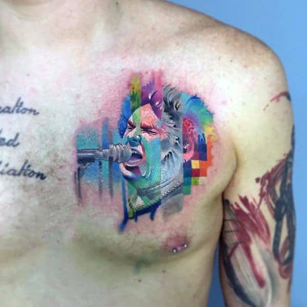 Colorful glitch tattoo of a singer passionately performing into a microphone, with vibrant pixel blocks and distortion effects on the chest