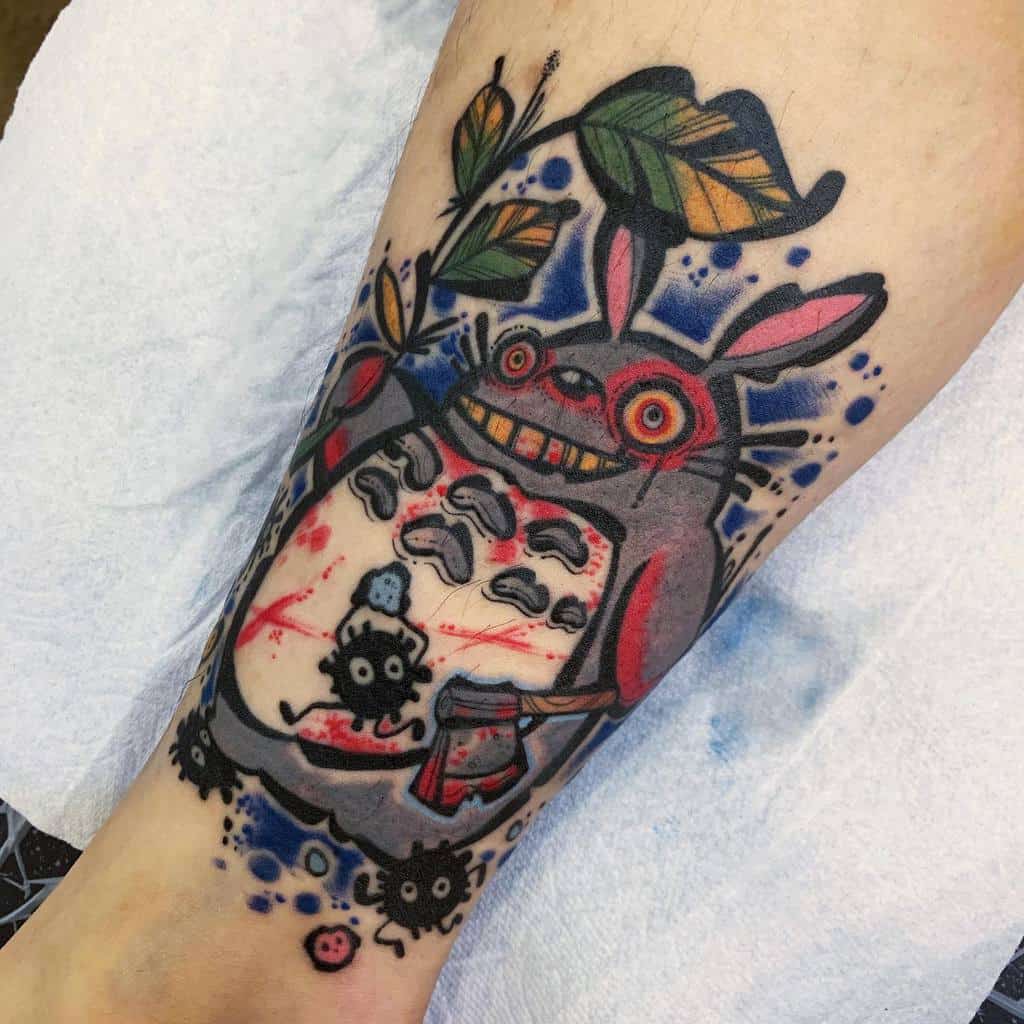 Colorful tattoo featuring a whimsical creature with leaves and small black figures