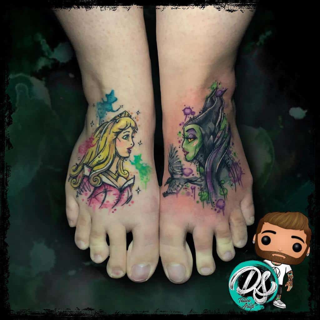 Watercolor-style tattoo featuring Maleficent and Aurora on opposite feet, showcasing their iconic contrast with vibrant hues