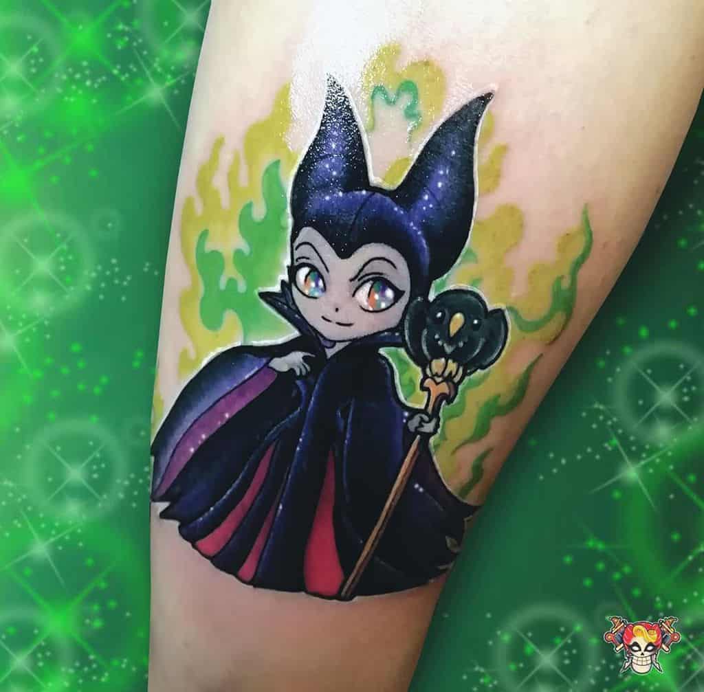 Adorable chibi-style Maleficent tattoo with glowing green flames, blending cuteness and mischief in vibrant watercolor hues