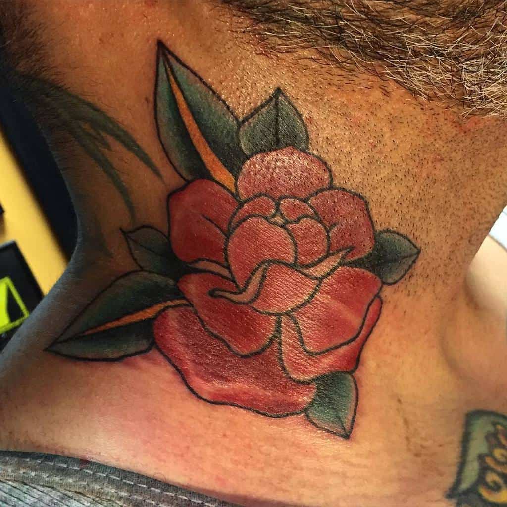 Neck tattoo of a red rose with green leaves