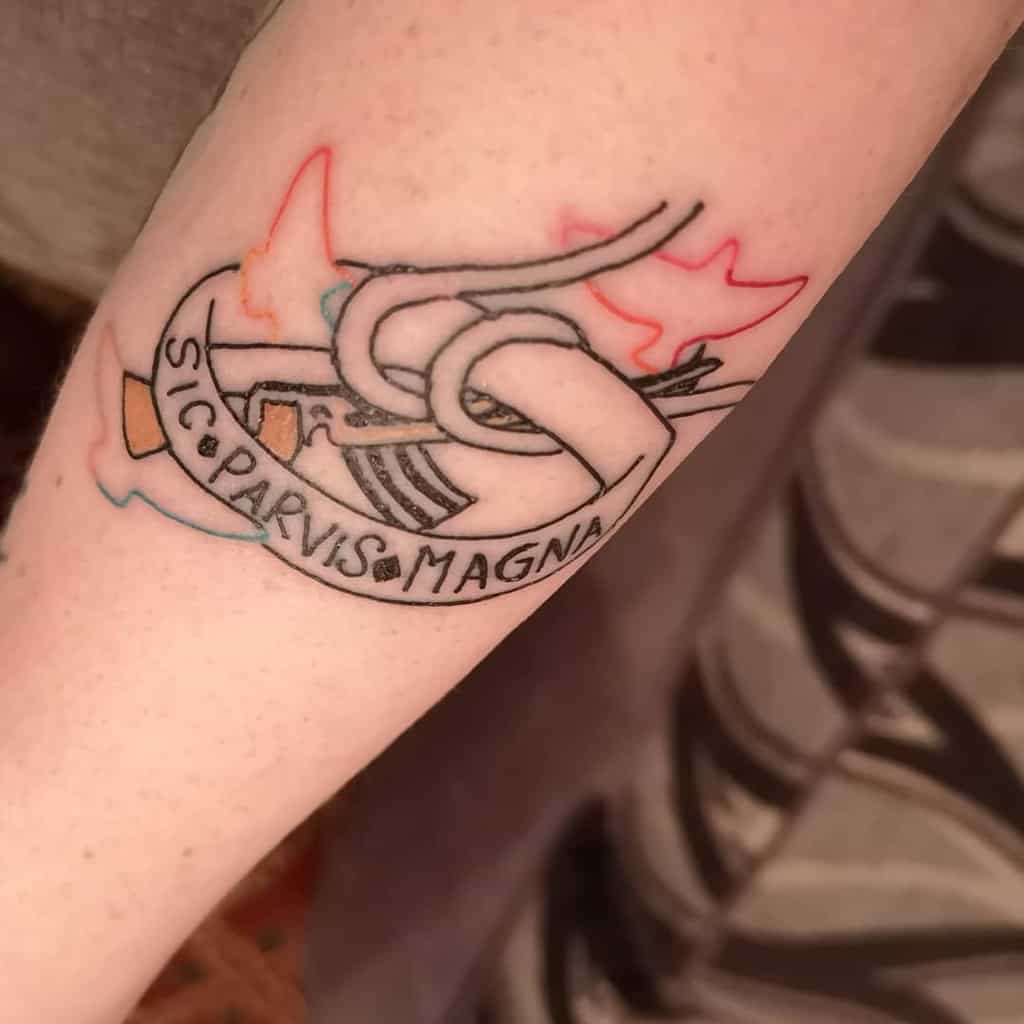 Tattoo of a sea vessel with a banner reading "Sic Parvis Magna" and flames in the background on an arm
