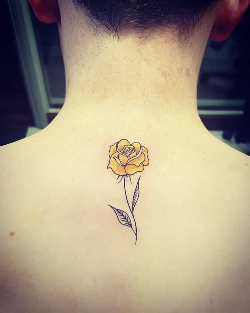 watercolor colored simple rose tattoos blondiekeogh