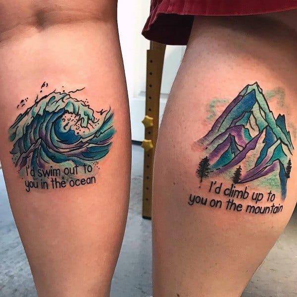Matching leg tattoos of an ocean wave and a mountain with heartfelt quotes, symbolizing the willingness to overcome any distance or challenge for love.