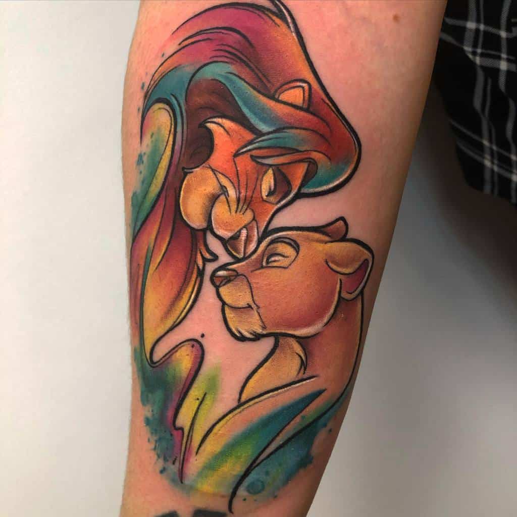 Vivid tattoo of Simba and Nala with flowing colors, capturing their affectionate moment with bright hues of orange, yellow, and teal blending together