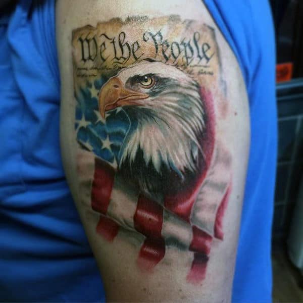 Waving American Flag We The People Upper Arm Tattoo For Men