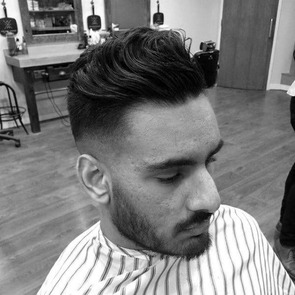 Wavy Medium Length Quiff Mens Skin Fade Haircut