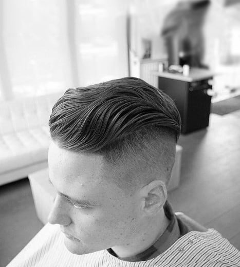 Wavy Slicked Back Undercut Hair For Guys