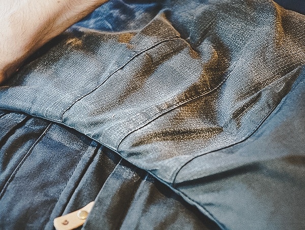 Waxing Fjallraven Jacket On Arms