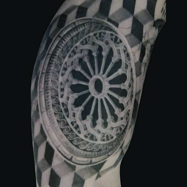 Wheel Circular Optical Illusion Tattoo On Bicep