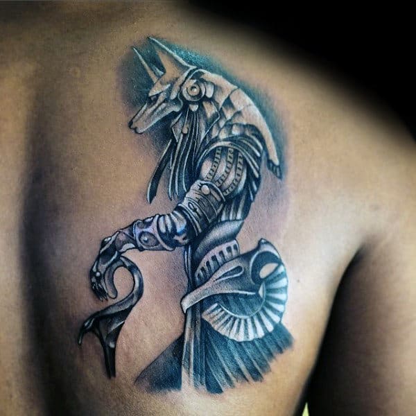 White And Black Ink Male Anubis Upper Back Tattoo Designs