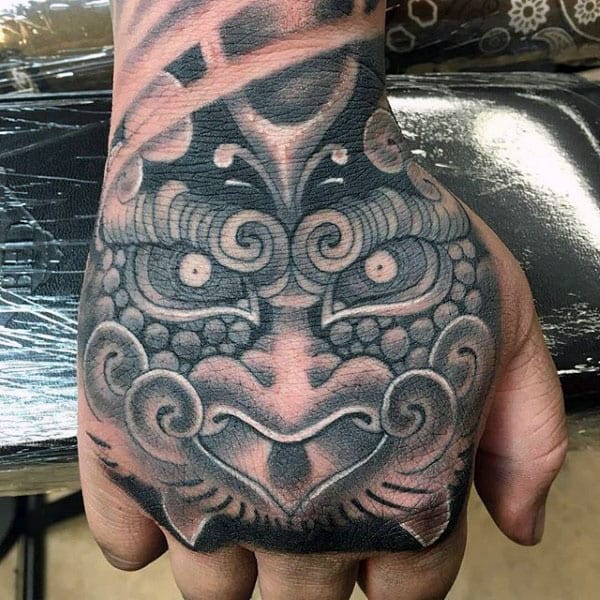 White And Black Ink Mens Foo Dog Hand Tattoos