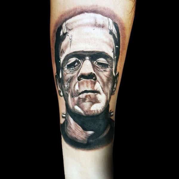 White And Black Ink Shaded Frankenstein Tattoo On Man