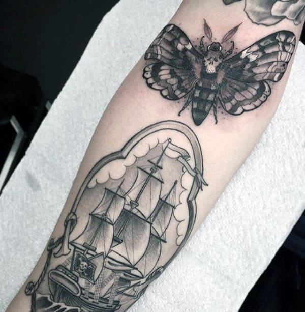 White And Black Ink Shaded Male Moth Forearm Tattoo Design Ideas
