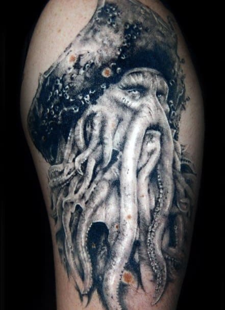 Realistic Davy Jones octopus pirate tattoo with detailed tentacles on an arm