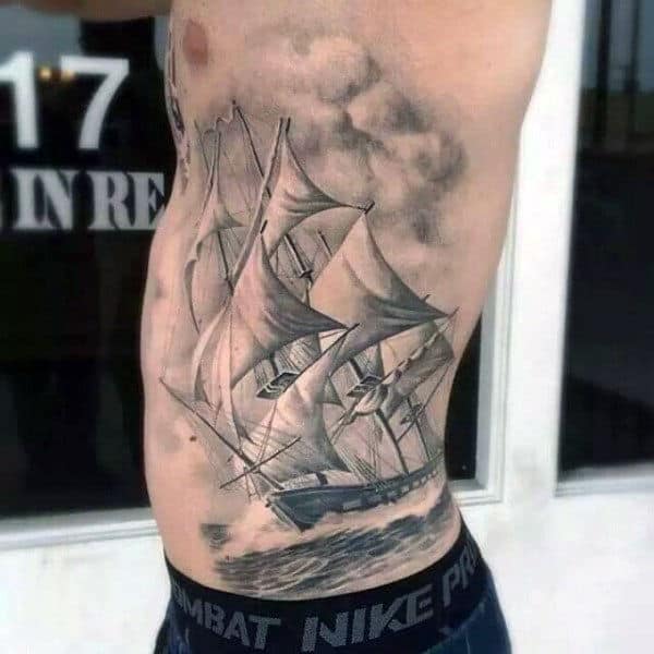 White And Grey Ink Shaded Sailing Ship Detailed Mens Rib Cage Side Tattoos