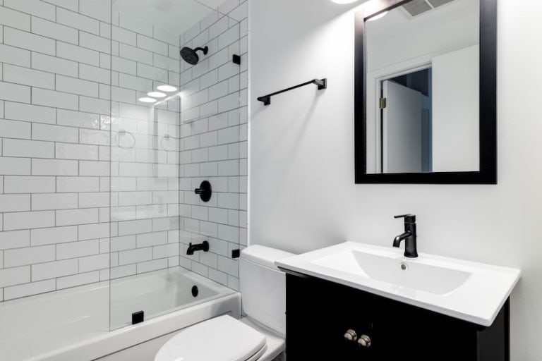 modern white bathroom with black accents