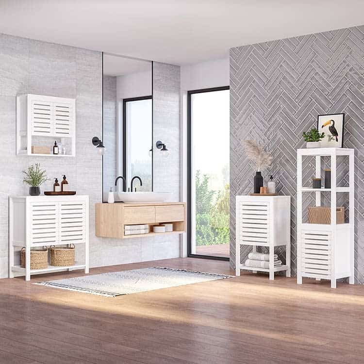 Modern bathroom with white storage cabinets, wooden vanity, and large mirrors in a bright space.