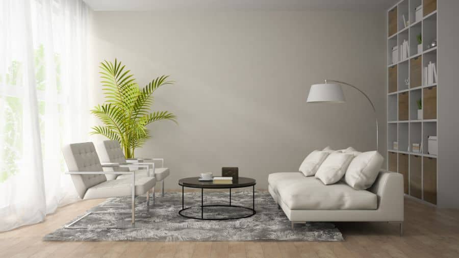 modern gray living room white couch black table shelves 