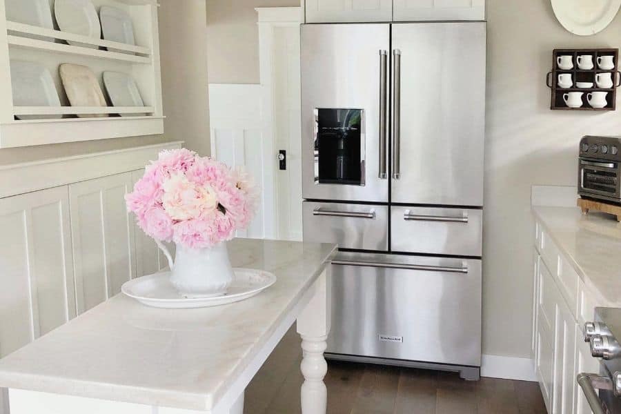 simple white farmhouse kitchen with island