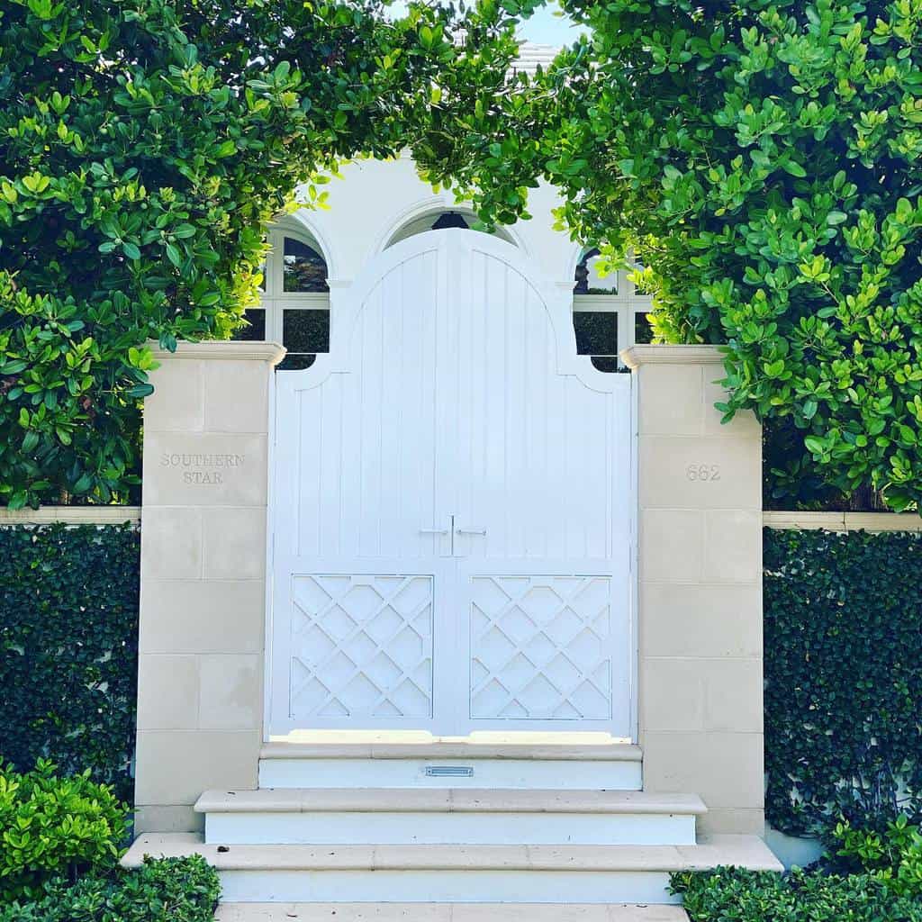 large white garden gate stone pillars