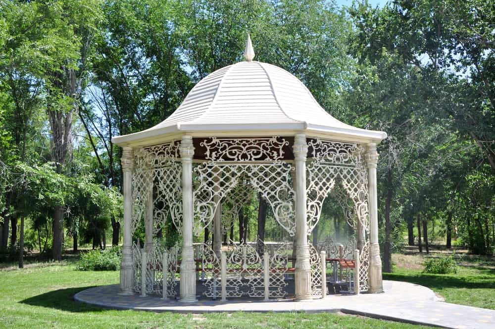 majestic white stone and metal gazebo wood bench seating