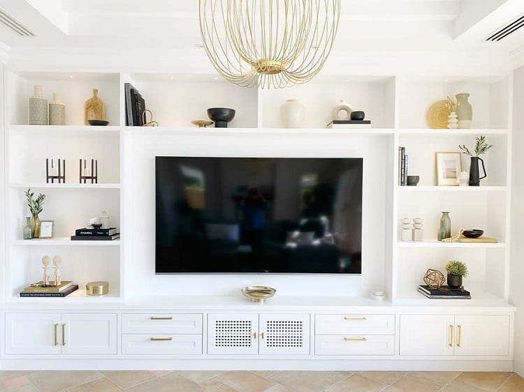 white gold built-in entertainment center tv chandelier