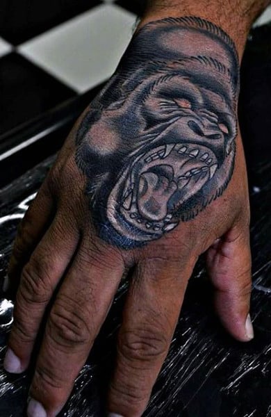 White Ink Gorilla Tattoo On Mans Hand