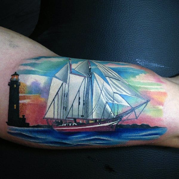 White Ink Sailboat With Skys Artistic Bicep Tattoos For Men