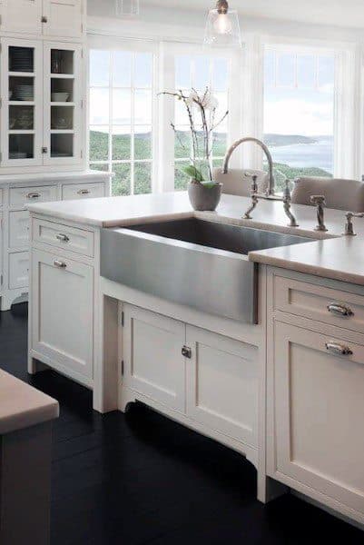 white kitchen cabinets with steel apron sink 