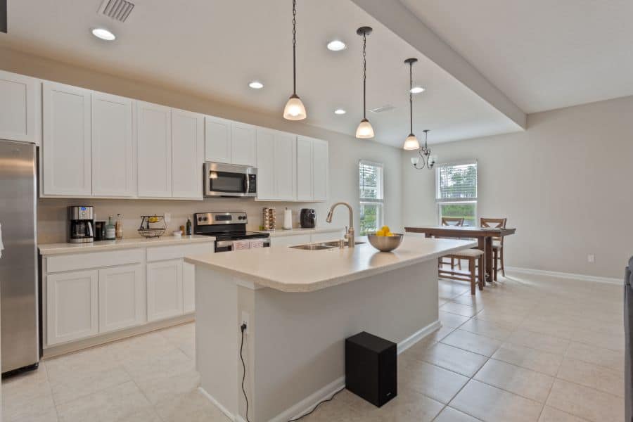 large open kitchen with white cabinets