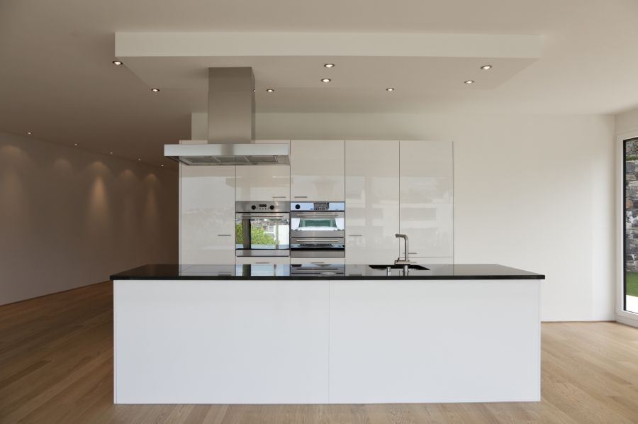 white minimalist open plan kitchen