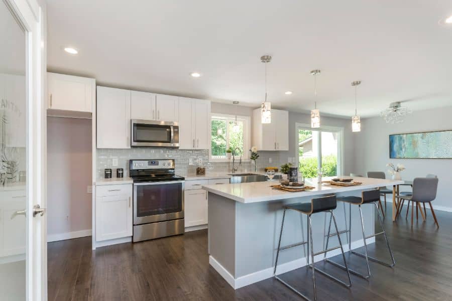 white kitchen open plan
