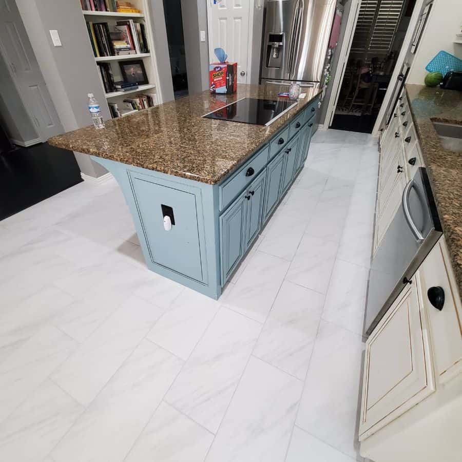 white kitchen floor tiles white and blue cabinets