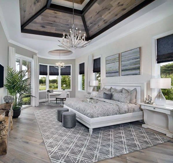 white master bedroom with vaulted wood ceiling