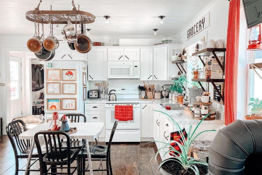 large white cabinet kitchen with vintage decor touches