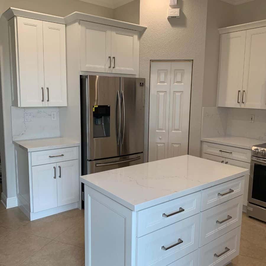 white small kitchen with island