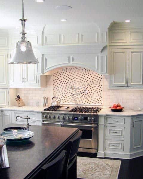 large white kitchen with dual ovens