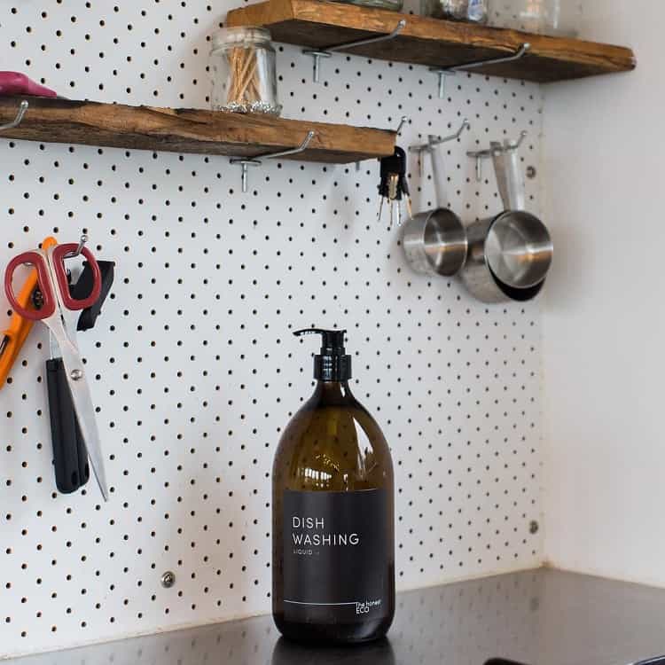white wooden kitchen pegboard