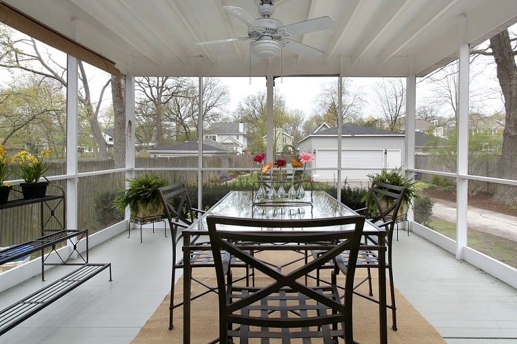 screened porch with railing
