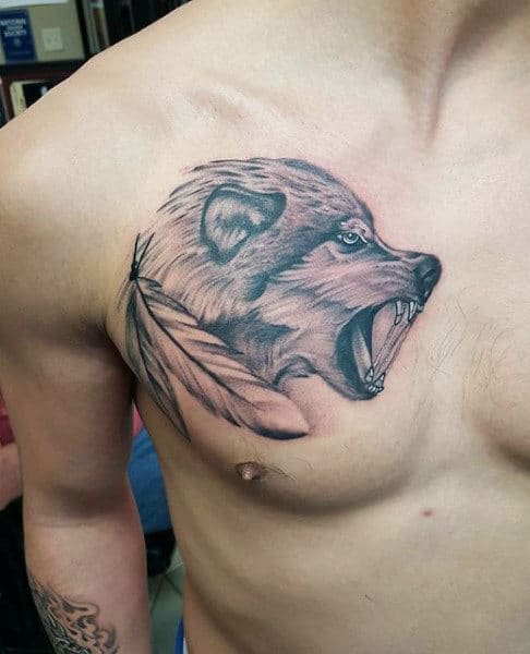 Wild Animal And Feather Tattoo On Chest For Male
