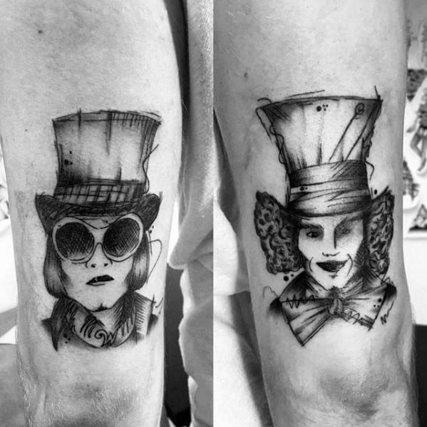 Sketch-style black ink tattoos of two Willy Wonka versions: one with round sunglasses and sleek hat, the other with curly hair and wide bow tie.