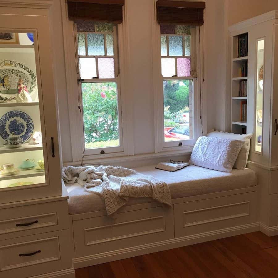 vintage window seat glass cabinets bookshelf