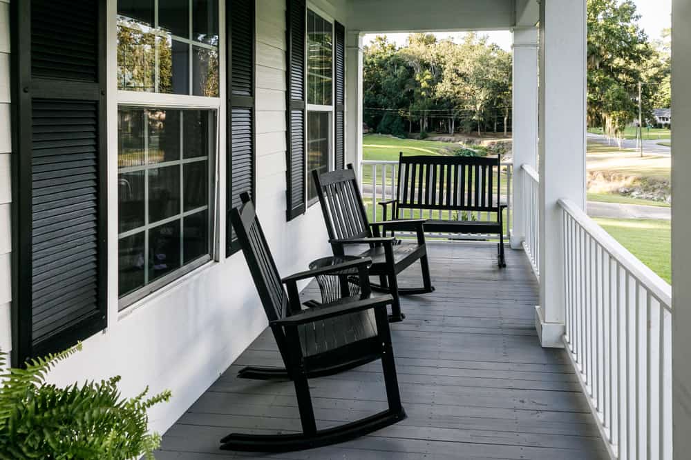 black window shutters front porch 