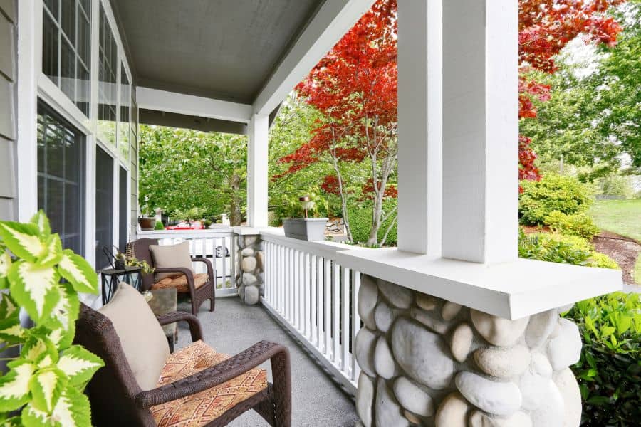 home with column porch railing