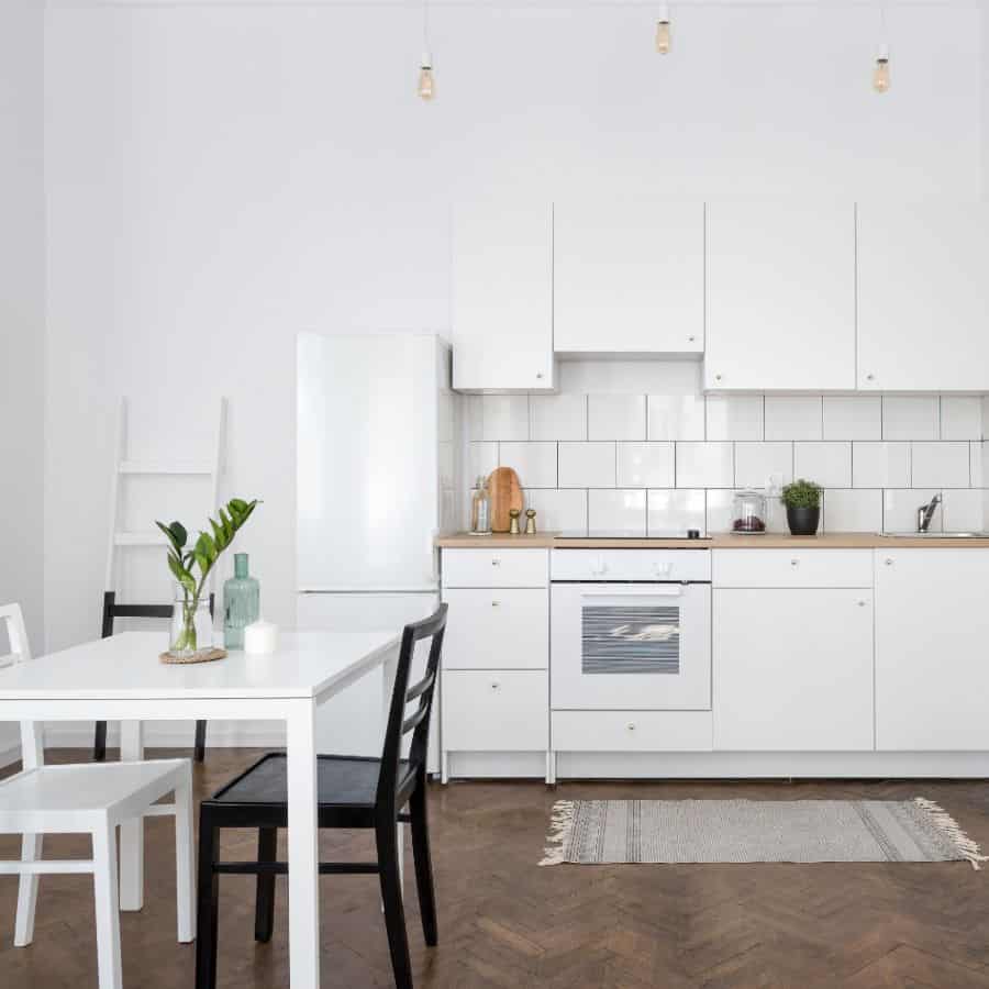 modern white kitchen with tile backsplash