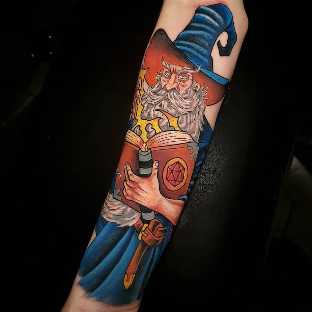 Bold Dungeons & Dragons tattoo of a powerful wizard with a blue hat, magical tome, and glowing spell, ready to unleash arcane energy