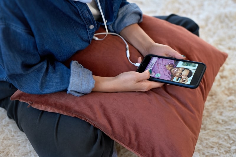 woman looking for a profile of a man on dating app